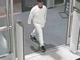 Man with white outfit as shown on security camera in case number 22-41036-2