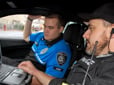 Cadet in training with Gresham police officer