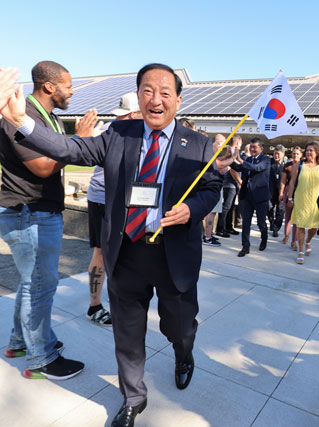 City of Gresham employees line up to welcome Mayor Mayor Le Byeone-seon and his delegation, from Sokcho, South Korea, during their 40th anniversary sister city visit in July 2025.